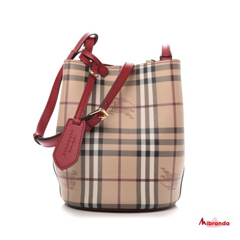 como saber si un bolso burberry es original|Bolsos y abrigos Burberry auténticos frente a falsificaciones.